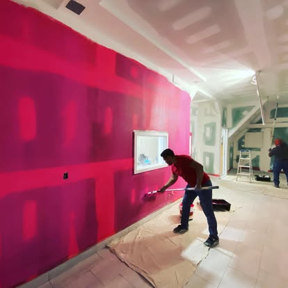 Finishing new drywall on a long interior wall
